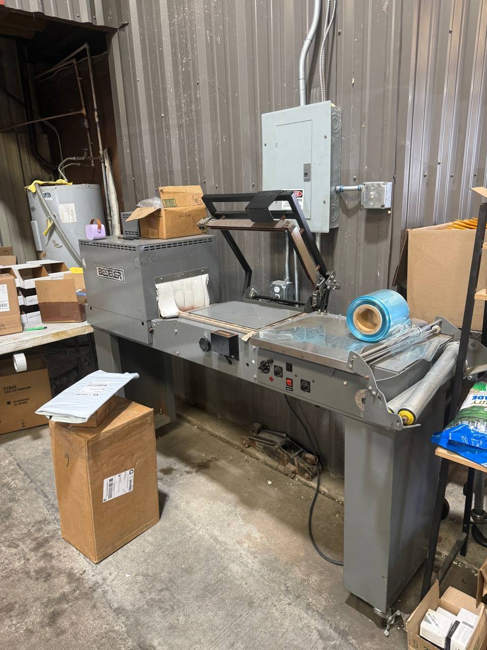 Beseler industrial shrink wrap machine at Asfar Distribution Houston warehouse